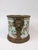 Hand painted planter with decorative flowers and birds. Ormolu mount with lion heads.