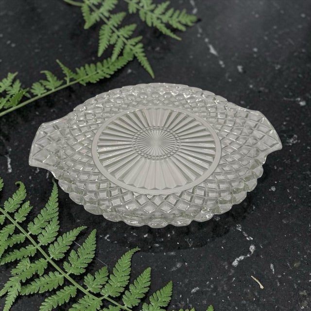 Vintage depression-era Waterford pattern clear cake platter. This pattern was manufactured by Hocking and has a...