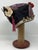 The scholar’s hat is full of symbolism to protect the child against evil and imbue them with important qualities such as...