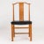 This set of twelve dining chairs in stained wood and leather was designed by Axel Larsson, and custom made for a Swedish...