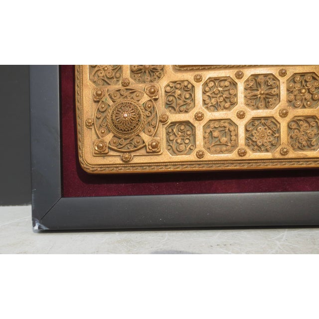 Cast zinc with copper patina on a very elaborate design of gears and medallions, jewel-like and delicate filagrees cover...