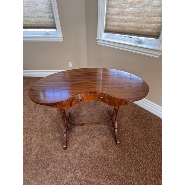 Slip butler desk. It has sliding board where you can put cups .