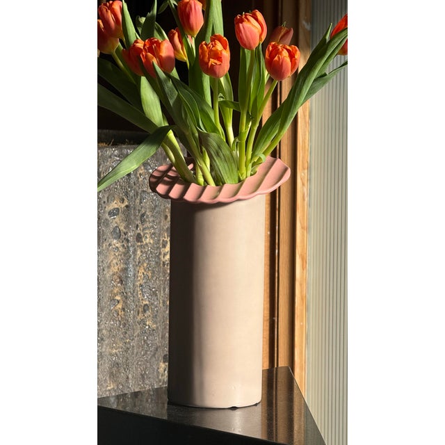 An unusual pink postmodern ceramic vase by Masa Mami, signed, Hawaii late 20th century. With a sturdy cylindrical base,...