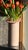 An unusual pink postmodern ceramic vase by Masa Mami, signed, Hawaii late 20th century. With a sturdy cylindrical base,...