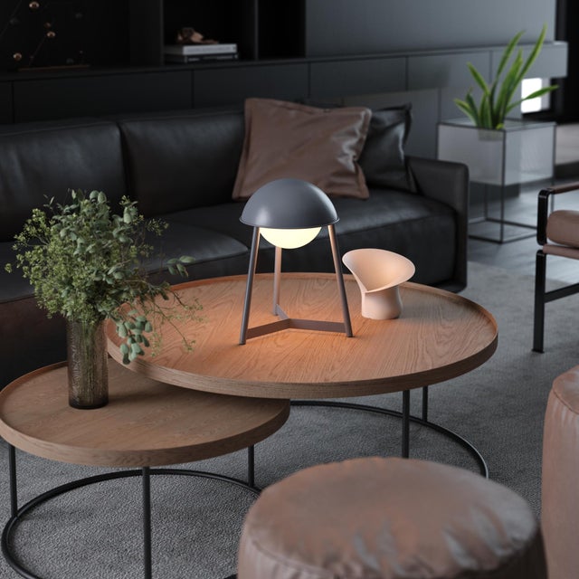 HELMET - where mid-century design meets cordless innovation. Crafted for sophisticated spaces, this distinctive table lamp...