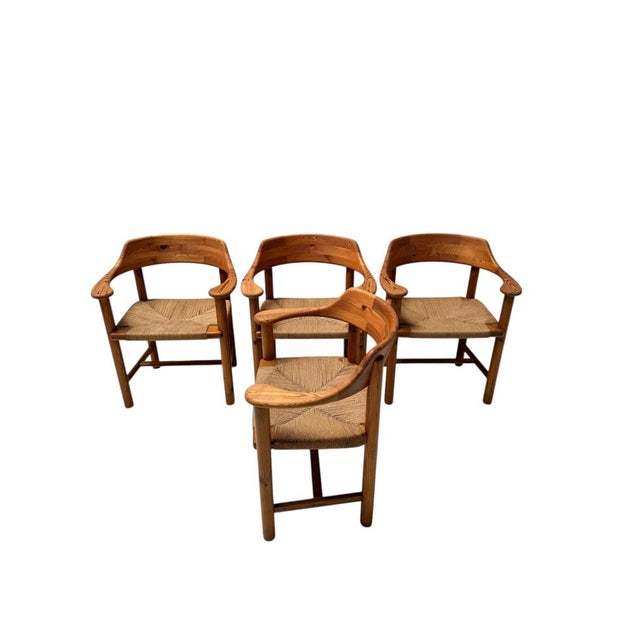 Stunning and organic set of four armchairs. Design by Rainer Daumiller. Striking Danish design from the 1970s. Solid pine...