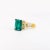18K yellow gold semi-precious gemstone ring. The center stone is a rectangular-brilliant cut blue-green tourmaline,...