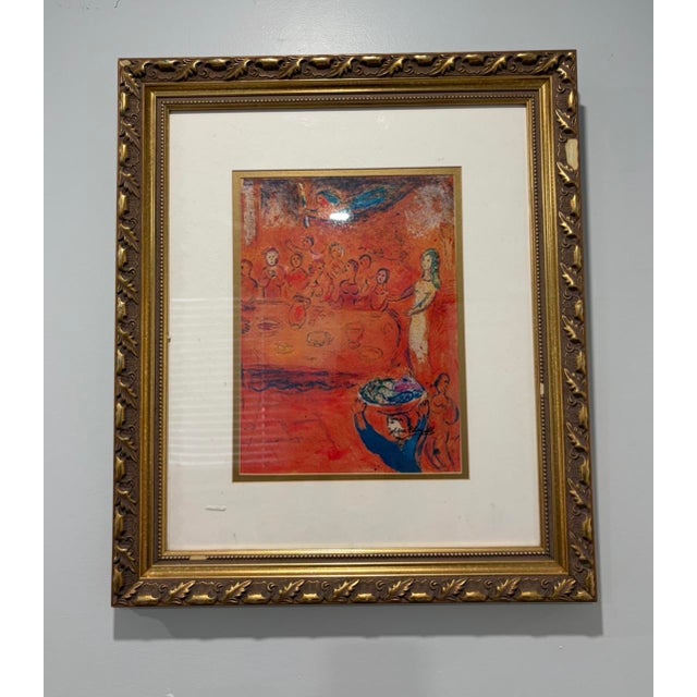 This framed artwork is a Marc Chagall print titled "Megacles Reconnait sa Fille Pendant Le Festin" (Megacles Recognizes...