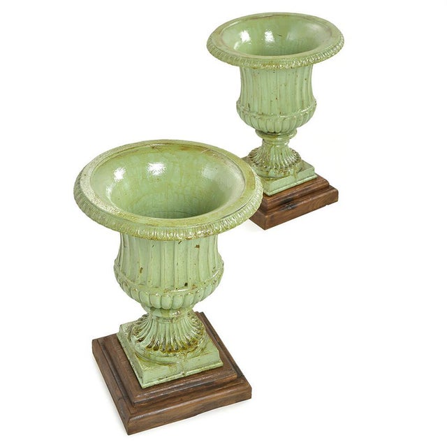 with their curved silhouette and delicately aged green patina, these cast iron Medici vases are decorative centerpieces,...