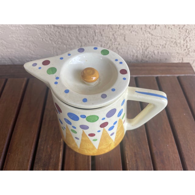 Here is a really neat Pitcher from the 1930 period with all the bells and whistles. It has a great pattern and marked...