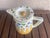 Here is a really neat Pitcher from the 1930 period with all the bells and whistles. It has a great pattern and marked...