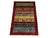 This khorjin saddlebag-inspired area rug features rows of small animal figures, trees, and patterned bands. A broad deep...