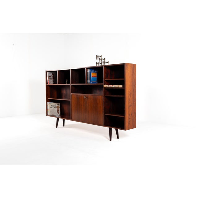 This beautiful vintage bookcase was made in Denmark by Farso Møbelfabrik. It is a classic mid century modern design from...