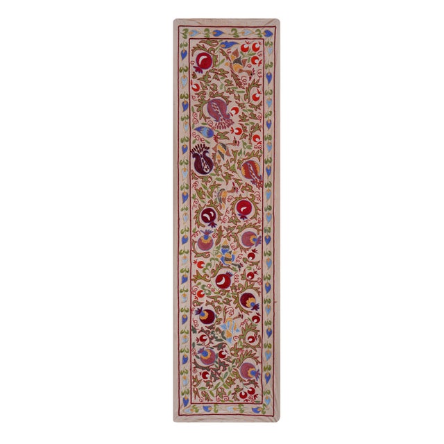 Vintage Suzani from Samarkand, circa 1900s. Dimension; 20'' x 75" inches /52 x 191 cm / 1'8'' x 6'3'' Material: Silk...