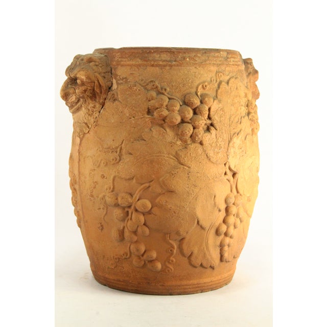 An outstanding Georgian era wine cooler Made of unglazed terracotta molded in relief with Neo-Classical Bacchic motifs...