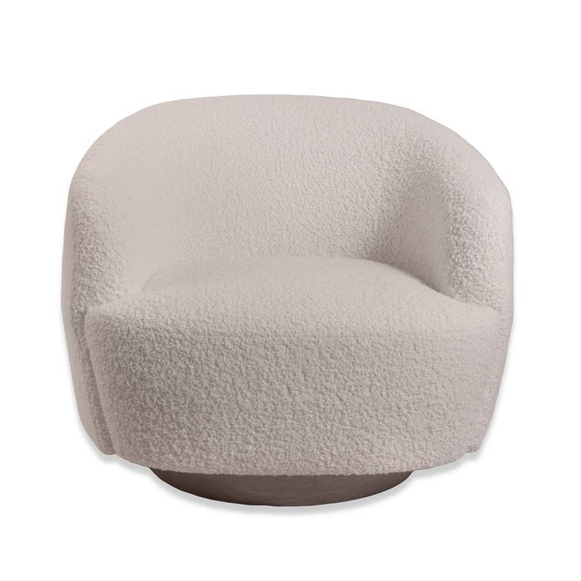 HOLLY HUNT Studio Sumo Swivel Lounge Chair A sculptural lounge chair defined by soft curves, generous proportions, and...