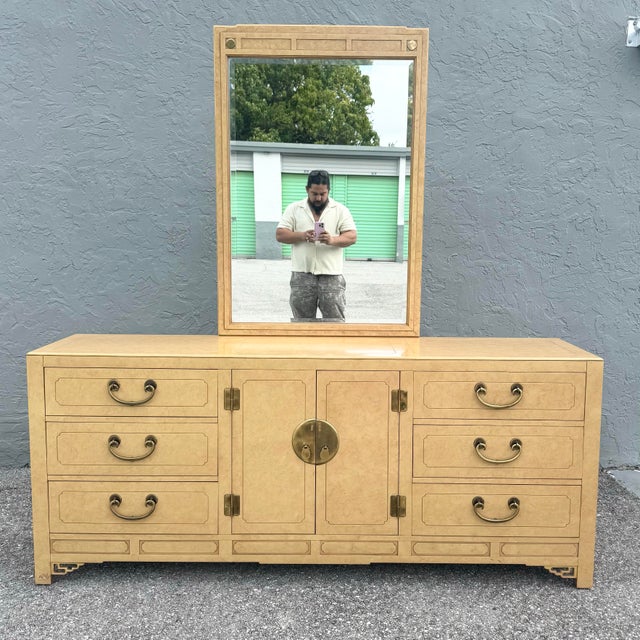 A refined vintage dresser by White Furniture, finished in a warm lacquered tone and richly influenced by chinoiserie...