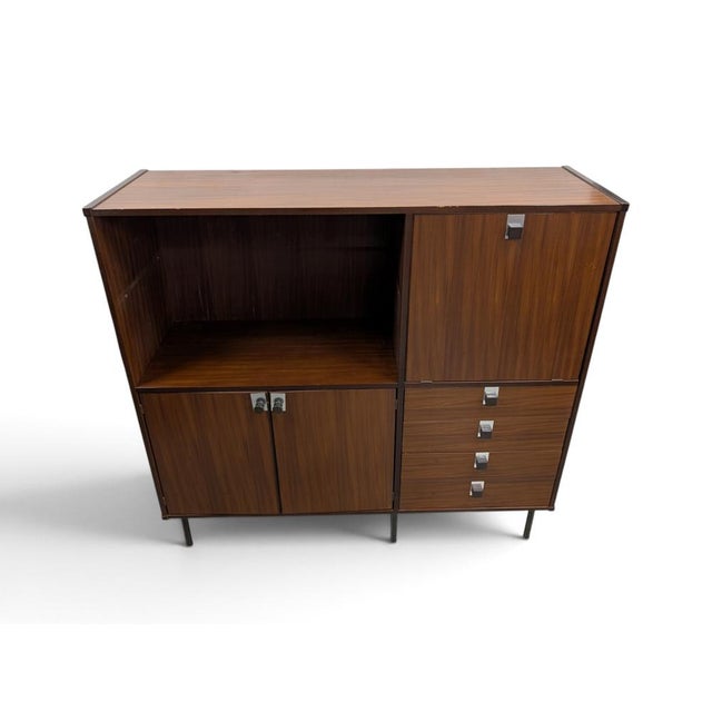 This is a multifunctional Italian-made storage unit dating back to the 1960s, crafted in a Mid-Century Modern style. The...