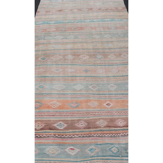 Tribal Mid 20th Century Mid 20th Century Vintage Turkish Gallery Kilim With Stripes and Tribal Motifs in Muted Tones For Sale - Image 3 of 13