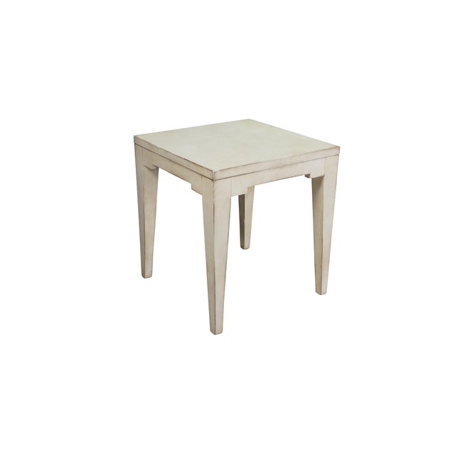 This vintage parchment-style painted bunching table features a clean, geometric silhouette heavily influenced by mid-...
