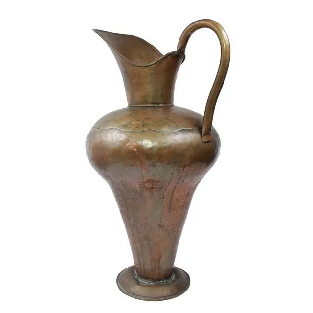 This wonderful hand hammered copper pitcher with handle will accentuate any table during the holidays. It’s very...