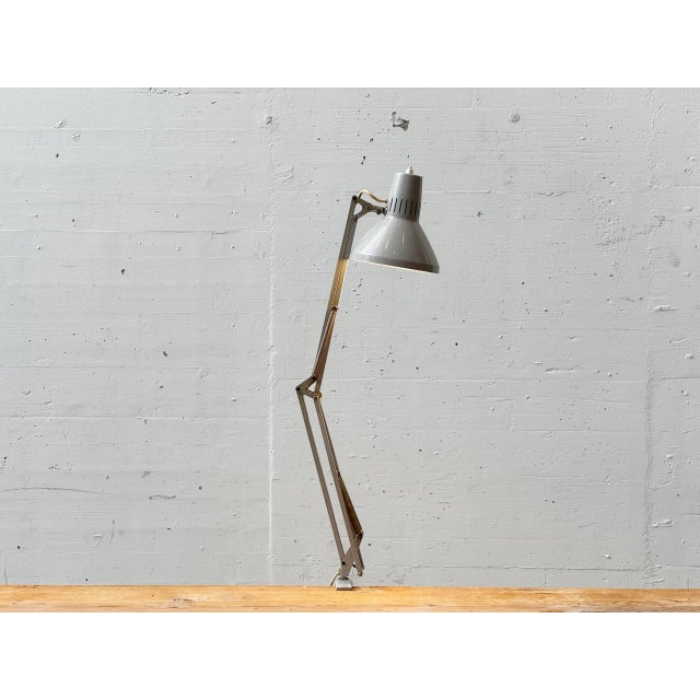 A classic architect's clamp lamp by ledu, made in sweden in the 1970s. The design follows the functional principle of the...