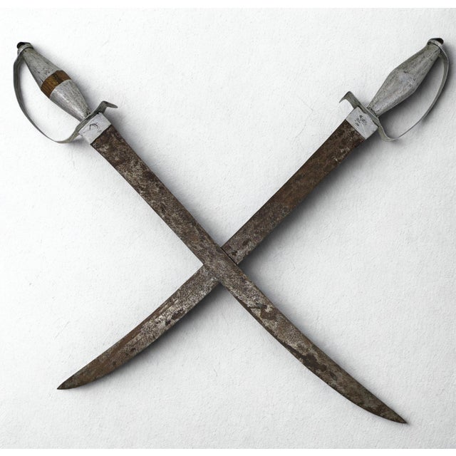 Traveling Man Treasures is selling this vintage (c. 1940s-1950s) pair of traditional Mandinka/Mandingo swords and...
