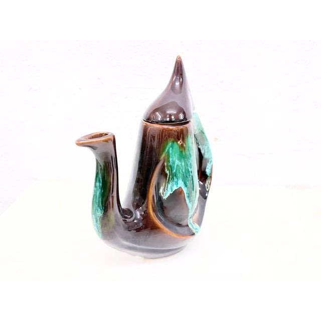 Tea set from the 1950s, made in the French ceramics town of Vallauris. 1 teapot: 26 x 23 x 10 cm, 4 cups: 7 x 10 x 8 cm, 1...