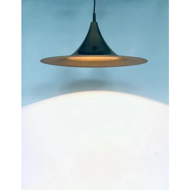 Vintage Postmodern Design Semi or Witch Hat Pendant Lamp, made in the 1980s. No maker markings. In the manner of the Semi...