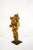 Fire-gilded terracotta sculpture with a wrought iron base. Signed by Pozzi 1950s This piece has an attribution mark, I am...