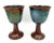 This pair of wine goblets are a testament to the artistry of mid-century studio potters. They use a combination of...