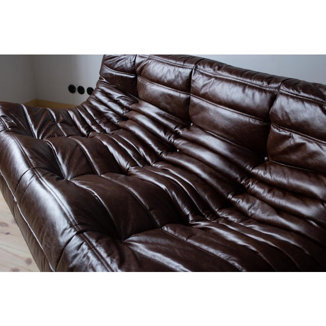 This Togo has been reupholstered with new foam and high-quality new fabric, keeping its inner structure giving the item...