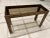 Parsons style sofa or console table, manner of Milo Baughman, Mastercraft, or John Widdicomb. Featuring solid hardwood...