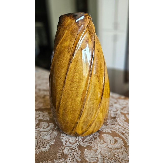 My great Aunt purchased this beautiful Van Briggle vase in the 1920s, during a trip to Colorado Springs. Founder Artus Van...