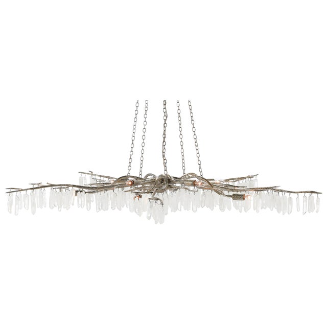 The Forest Light Silver Chandelier is an exceptional work of art dripping with quartz crystals. The textured silver finish...