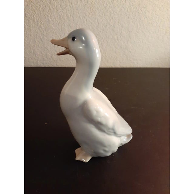 This is an Otagiri Porcelain 5" Duck Figurine. Procured at auction BOX D