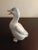 This is an Otagiri Porcelain 5" Duck Figurine. Procured at auction BOX D