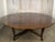 A masterclass in both form and function, this exceptional dining table marries Old World craftsmanship with ingenious...