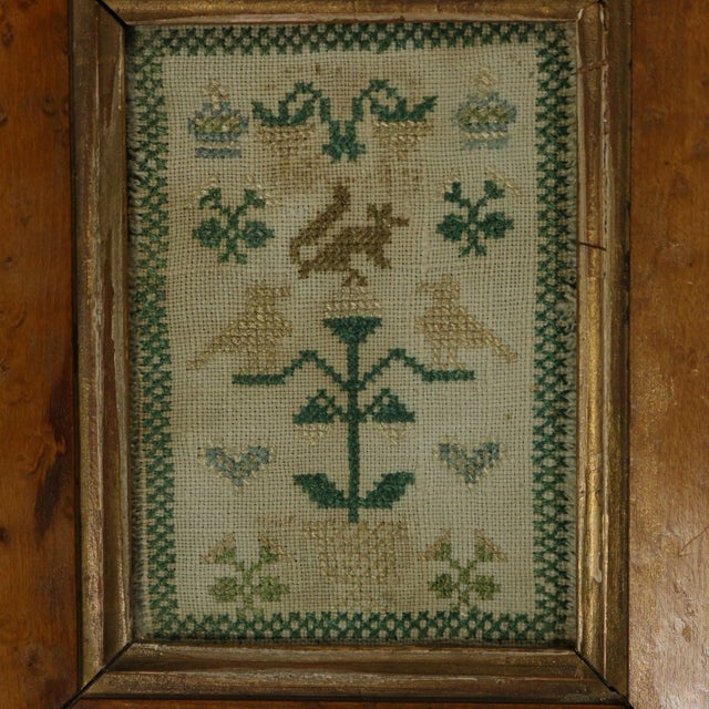 Georgian Mini Sampler, circa 1830. The sampler is worked in silk threads on a linen ground, in cross stitch throughout....
