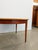Authentic vintage mid century modern teak extendable dining table with 1 built-in leaf. This piece is in excellent...