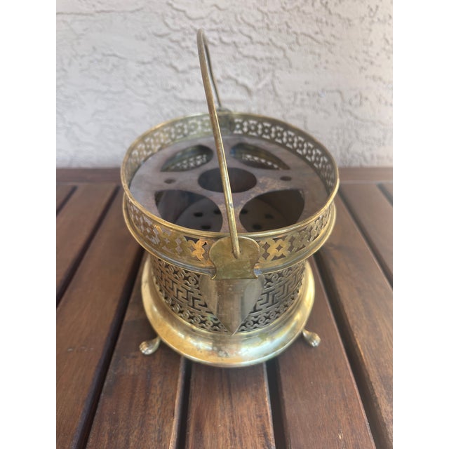 Antique French Victorian reticulated brass food or foot warmer featuring paw feet, handle and iron insert. Condition Fair...