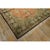 A one-of-a-kind vintage Qum silk rug, The composition centers on a medallion design over a beige ground, executed in the...