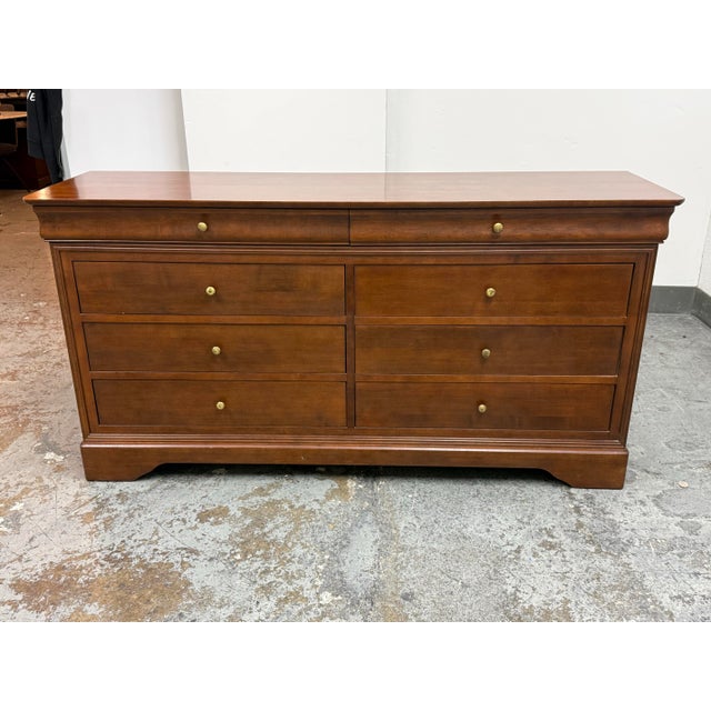 Design Plus Gallery presents a Louis Philippe Dresser by Shermag. This dresser offers a classic Louis Philippe design with...