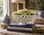 An elegant trompe l'oeil porcelain cachepot or fruit bowl crafted in the form of a handwoven rope basket. Executed in...