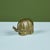 Elephant piggy bank sculpture. The brass sculpture has a slit at the top which allows you to drop in coins and cash....