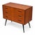 This refurbished G-Plan Fresco Chest of Drawers is an iconic mid-century piece, crafted from teak and featuring tapered...