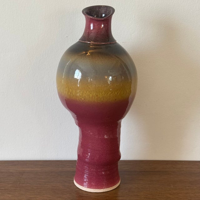 Vintage California studio pottery vase featuring a rich oxblood and ochre flambé glaze. Signed and dated Clark 2003/2004...