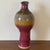 Vintage California studio pottery vase featuring a rich oxblood and ochre flambé glaze. Signed and dated Clark 2003/2004...