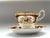This elegant Royal Albert Lady Hamilton cup and saucer set dates to the 1940s and features a Victorian-inspired...