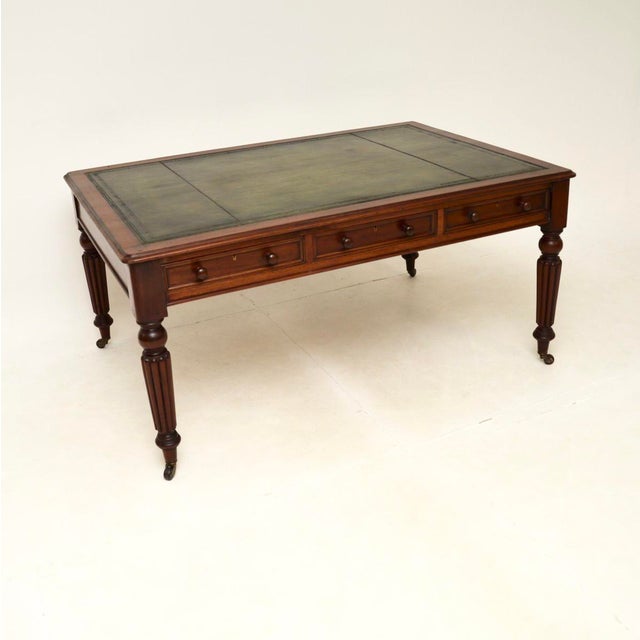 A large and beautiful antique Victorian partners desk / writing table. This was made in England, it dates from around...
